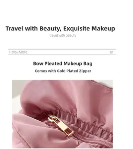Close-up of pink cross fabric texture and gold plated zipper detail on cosmetic bag
