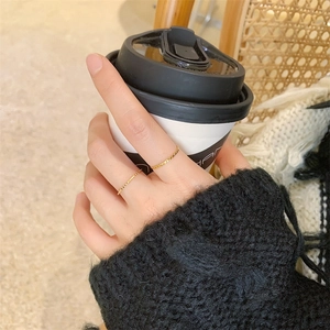 Minimalist 18K gold plated thin ring set with twisted and geometric textured patterns