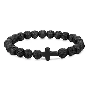 Macro shot of 8mm black lava stone beads with matte black cross charm detail