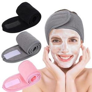 Three-pack of adjustable spa headbands in black, grey, and pink soft microfiber fabric