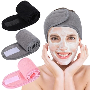 Adjustable spa headbands with velcro closure in black, pink, and grey for skincare