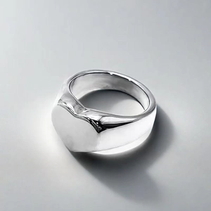 Minimalist polished stainless steel heart ring with a stylish silver finish for women