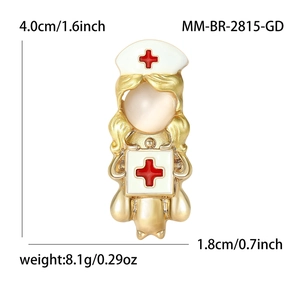 Fashionable nurse brooch with gold alloy base and white enamel plus a cat-eye stone