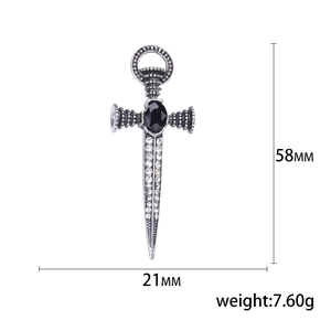Vintage Gothic sword brooch with black oval stone and sparkling white crystals