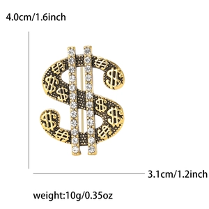 Hip hop gold dollar sign brooch with white rhinestones measuring 4.0cm by 3.1cm