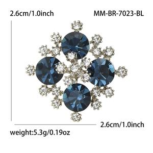 Blue crystal snowflake brooch with rhinestones and dimensions 2.6cm 5.3g shown on white background
