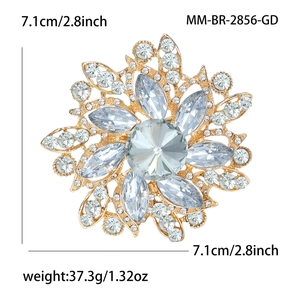 Détails de taille et poids pour cette luxueuse broche tournesol ornée de strass brillants
