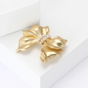 Elegant gold bow brooch with white pearls for women's fashion and classic style accessory