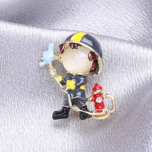 Cartoon firefighter brooch with enamel finish and cat eye stone for suits and jackets