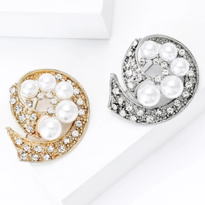 Elegantes broches en espiral con perlas y pedrería en acabado dorado y plateado