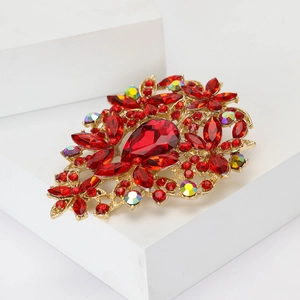 Elegant vintage style floral brooch with red crystals and AB rhinestones on gold alloy