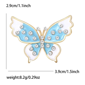Broche papillon exquise dorée avec émail bleu et strass incluant les dimensions précises