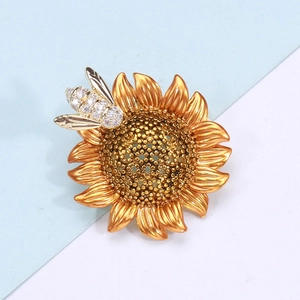 Exquisite sunflower and bee brooch with golden petals and sparkling zircon accents