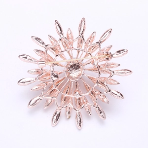 Detailed back view of rose gold sunflower brooch showing the sturdy horizontal safety pin