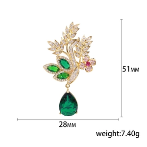 Broche plante élégante en or avec fleurs en zircon et pendentif goutte vert