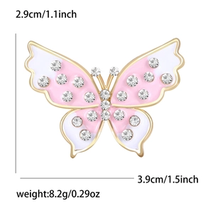 Broche papillon en émail rose et blanc avec cristaux brillants et métal doré