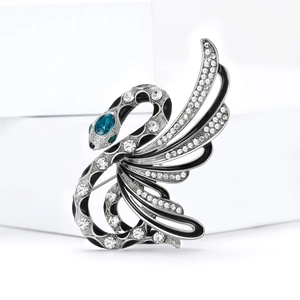 Swan brooch with blue pear-shaped stone and black enamel on silver-tone alloy base
