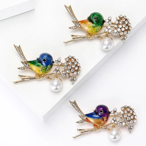 Charming bird brooches with colorful enamel, sparkling rhinestones, and elegant white pearls