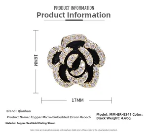 Macro detail of camellia brooch with zircon inlay and measurements of 16mm by 17mm