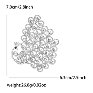 Peacock brooch dimensions 7.0cm height and 6.3cm width with rhinestone details