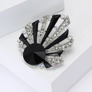 Sparkling silver shell brooch with large black crystal and colorful rhinestones