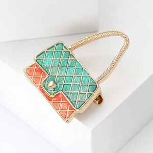 Fashionable enamel handbag brooch with diamond grid pattern and gold heart decoration
