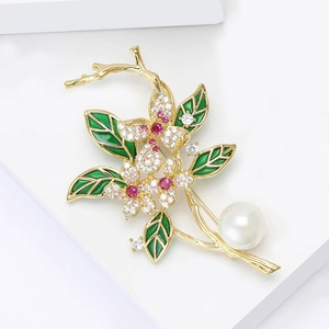 Luxury floral brooch with white zircon petals, green enamel leaves and large white pearl