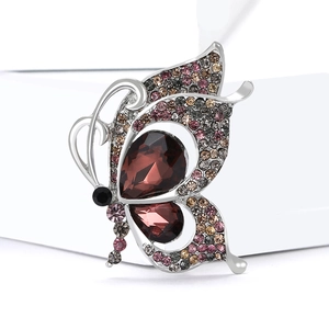 Elegant butterfly brooch with deep red crystals and colorful rhinestones in silver alloy