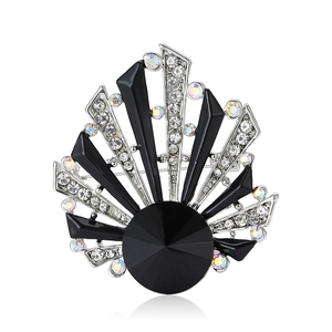 Elegant silver shell brooch with central black gemstone and crystal rhinestones