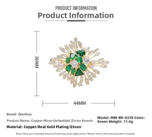 Close-up of emerald flower brooch with dimensions 44mm x 36mm and 11.4g weight detail