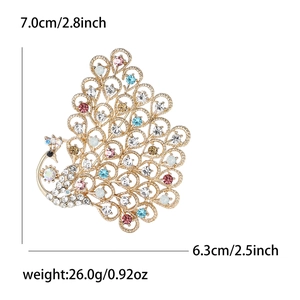 Vintage oversized peacock brooch with colorful rhinestones in gold alloy metal finish