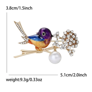 Charming bird brooch with purple gradient enamel and rhinestones on a golden branch