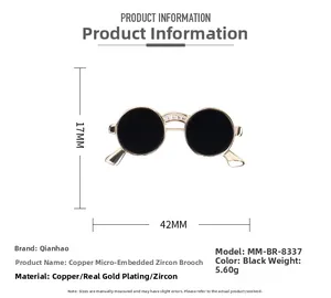 Macro shot of 42mm sunglasses brooch featuring gold plating and micro-set zircon