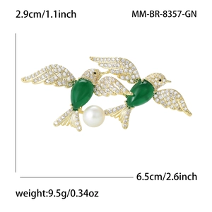 Exquisite gold bird brooch with green marquise stones, crystals and pearl dimensions