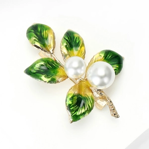 Elegant plant brooch with green enamel leaves, white pearls and gold alloy branch details