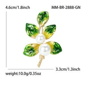 Enamel plant brooch with pearls and gold alloy leaves shown with size dimensions
