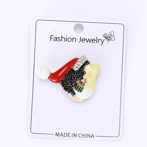 Detail showing enamel Christmas hedgehog brooch with sparkling rhinestones and gift box