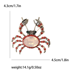 Vintage crab brooch with red rhinestones and opal stone for suits and shirts