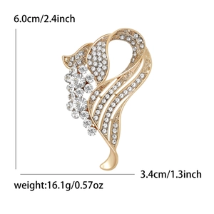 Elegant gold-tone crystal brooch with floral rhinestones, size 6.0cm by 3.4cm