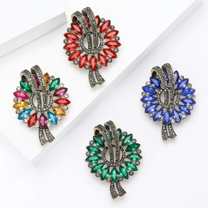 Vintage marquise crystal flower brooches in four colors on minimalist white background