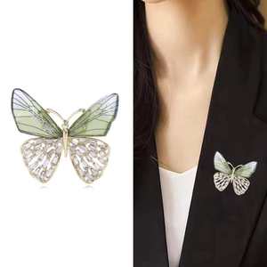 Elegant gradient rhinestone butterfly brooch in gold alloy finish for women