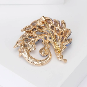 Vintage hedgehog brooch with crystal rhinestones on a gold alloy base and colorful gemstones