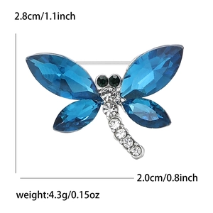Broche libellule étincelante avec ailes en cristal bleu et finition alliage argenté