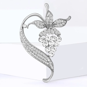 Elegant silver grapevine brooch with sparkling white rhinestones in a heart design