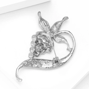Detailed back view showing the silver-tone brooch pin fastener and polished metal finish