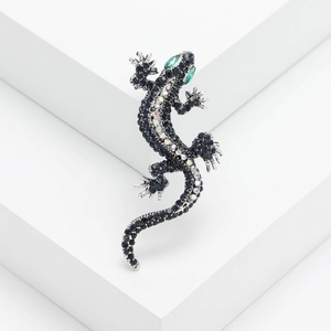 Sparkling gecko brooch with blue rhinestones and green gem eyes on silver alloy base