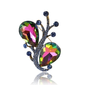 Eleganter goldener Kristall-Zweig-Brosche mit schillernden Steinen und blauen Edelsteinen