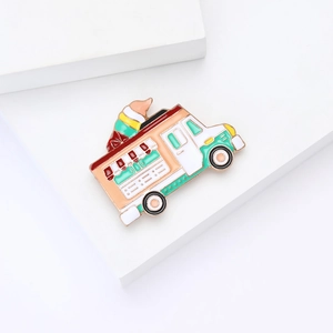 Charming enamel ice cream truck brooch in vibrant orange and mint green for women's fashion