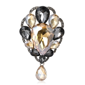 Vintage luxury brooch with pear-cut smoky glass gems and champagne stone pendant drop