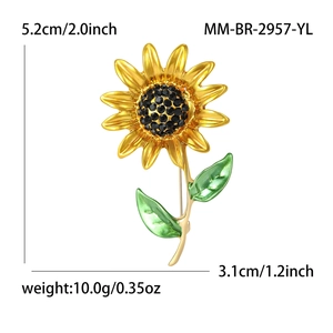 Broche tournesol en alliage doré avec strass noirs et feuilles en émail vert vif